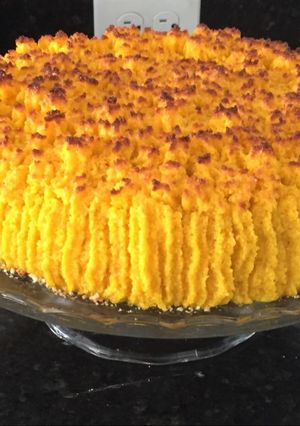 Una foto de Torta de coco y dulce de leche
