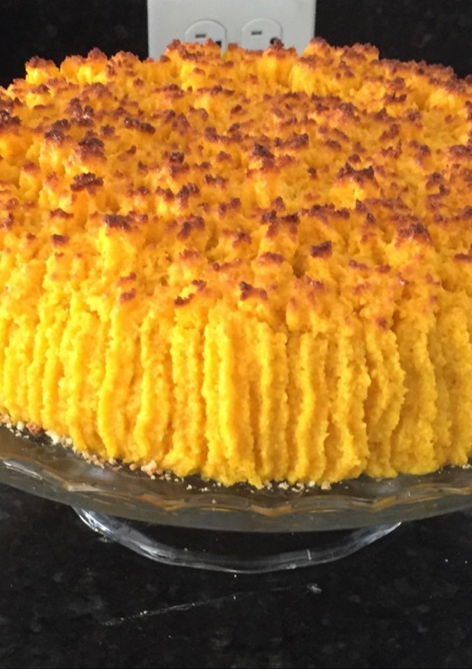 Una foto de Torta de coco y dulce de leche