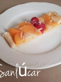 Una foto de Cinta de crema con frutilla