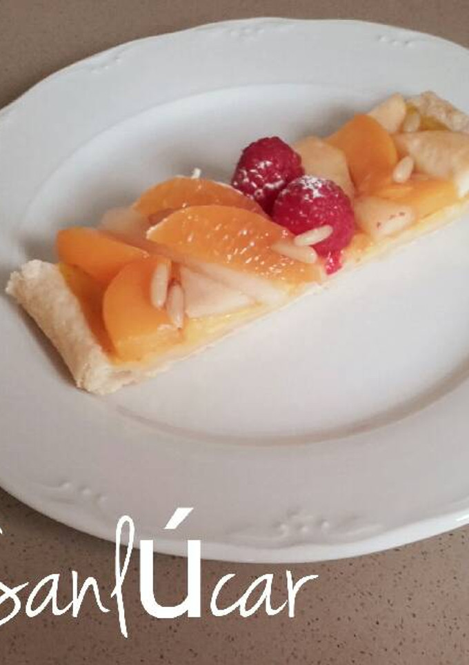 Una foto de Cinta de crema con frutilla