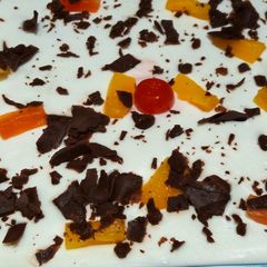 A picture of 3 layers creamy dessert.