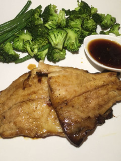 A picture of Honey glazed fish with steamed veggies.