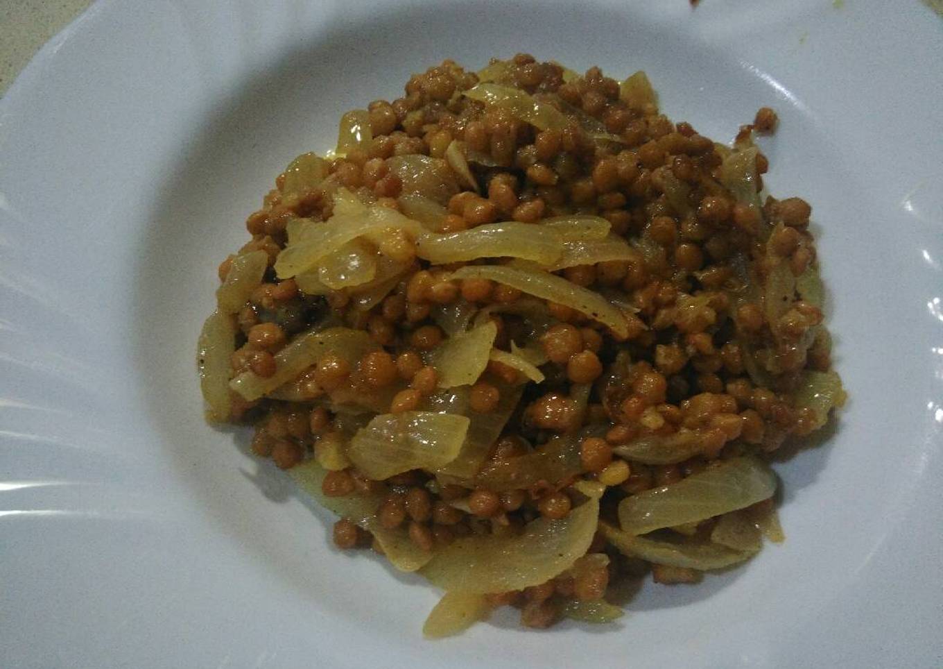Lentejas encebolladas a la naranja