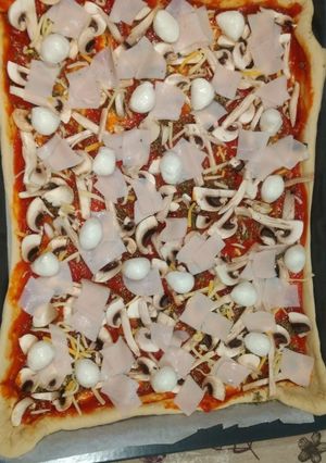 Una foto de Pizza con masa de pan