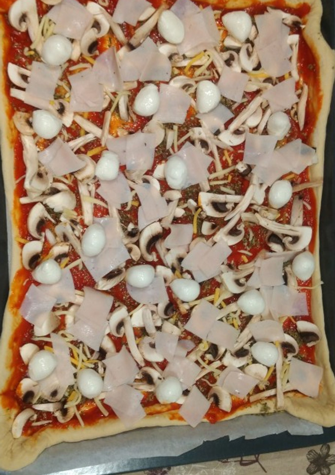 Una foto de Pizza con masa de pan