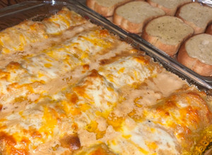 A picture of Blackened chicken Alfredo lasagna roll ups.
