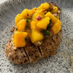 A picture of Garlic Lime Chicken with Mango Salsa.