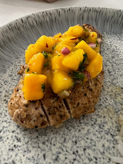 A picture of Garlic Lime Chicken with Mango Salsa.