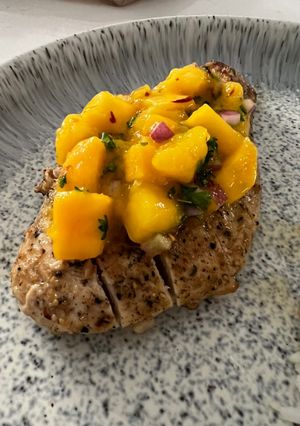 A picture of Garlic Lime Chicken with Mango Salsa.