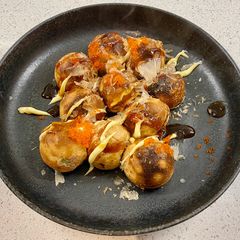 A picture of Takoyaki (octopus balls).