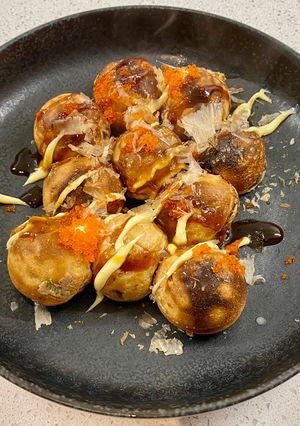 A picture of Takoyaki (octopus balls).