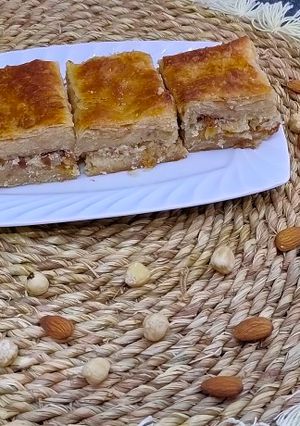 صورة لوصفة رقاق حلو باللبن والسكر والمكسرات