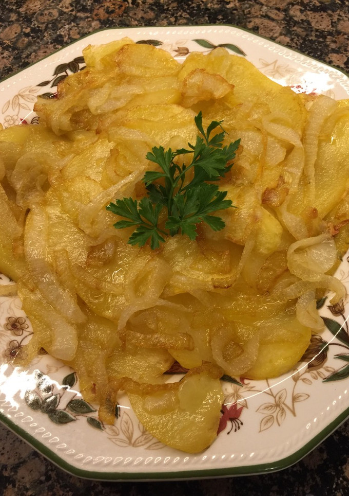 Una foto de Patatas panadera y cebollita