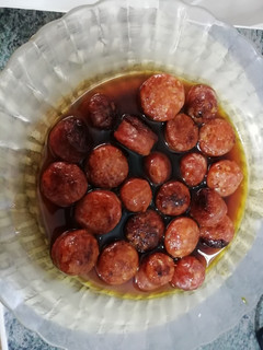 Una foto de Chorizo al vino blanco