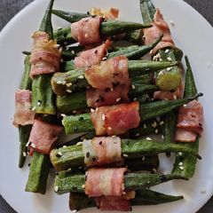 A picture of Lady's Finger Wrapped with Bacon.