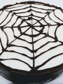 Una foto de Tarta de queso de tela de araña para Halloween (sin horno)
