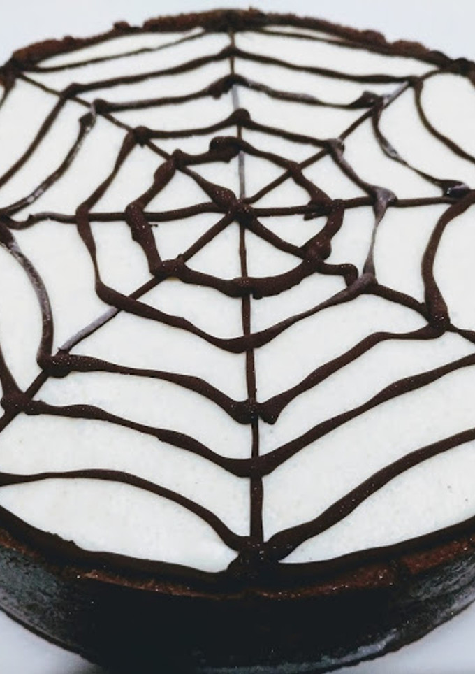 Una foto de Tarta de queso de tela de araña para Halloween (sin horno)