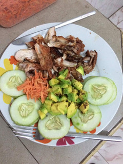 A picture of Grilled chicken with cucumber,carrots and avacado.