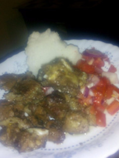 A picture of Fried beef with kachumbari and ugali.