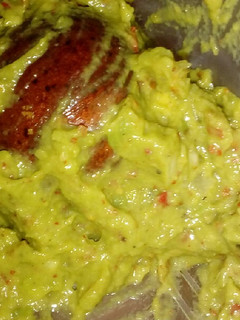 Una foto de Guacamole común y picante
