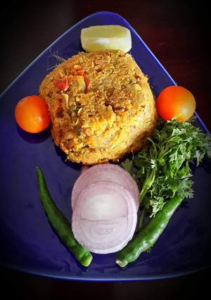 A picture of Loitta Maacher Jhuri /Bombay Duck Crumbled Fish Curry.