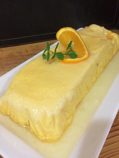 Una foto de Flan 🍮 de naranja 🍊