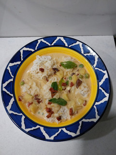 A picture of Iddiyapam with Vegetable stew.