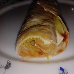 A picture of Cheese potato fry Chapati roll.