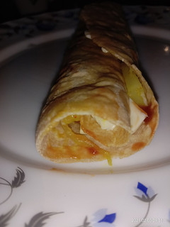 A picture of Cheese potato fry Chapati roll.