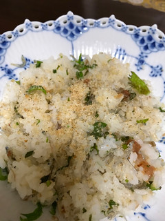 A picture of Pickled plum rice with ooba and sesami.