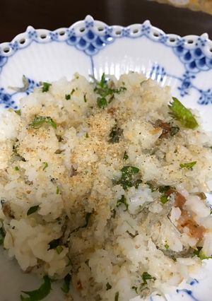 A picture of Pickled plum rice with ooba and sesami.