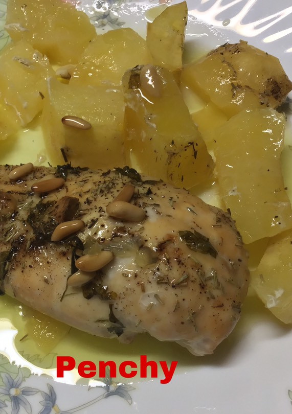 Una foto de Pechugas al horno con piñones y aceite de trufa blanca