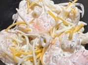 A picture of noodles with shrimp