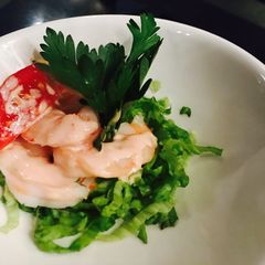 A picture of Prawns with white sauce.