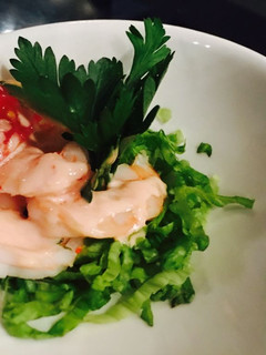 A picture of Prawns with white sauce.