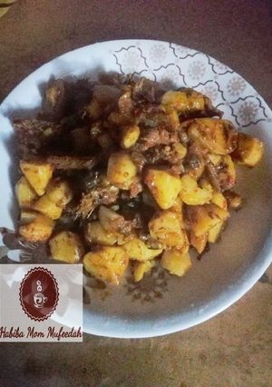 A picture of Potatoes poridge with stock fish.