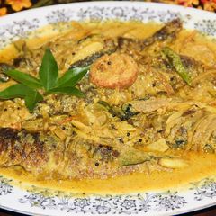 Kerala Style Fried Sardines in Coconut Gravy A picture of Kerala Style Fried Sardines in Coconut Gravy.