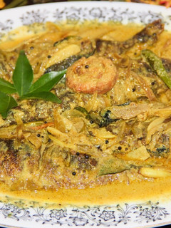 A picture of Kerala Style Fried Sardines in Coconut Gravy.