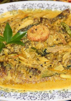 A picture of Kerala Style Fried Sardines in Coconut Gravy.