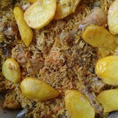 A picture of Chicken Breyani & Dhall.