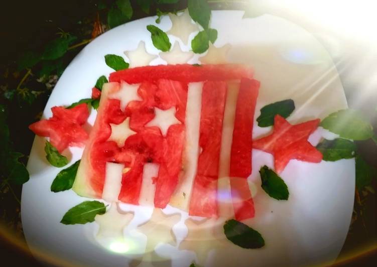 Red yellow melon dessert in the shape of a flag