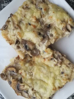 Una foto de Tostadas de champiñones