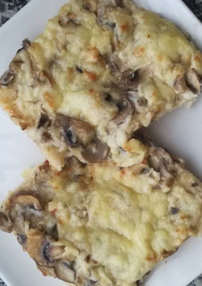 Una foto de Tostadas de champiñones