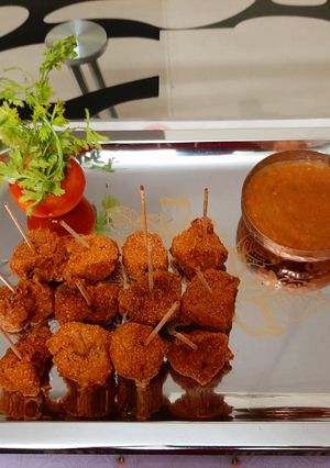 A picture of Mix veg sooji fritters.