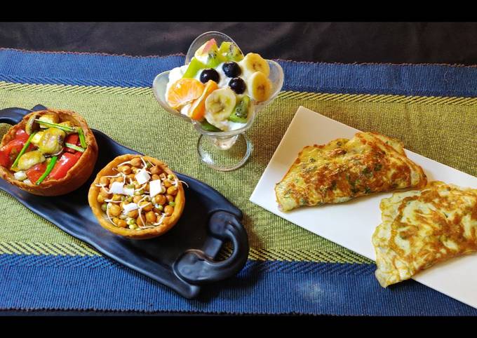 Oats fruits, sprouts, roasted veggies,cheese omelette