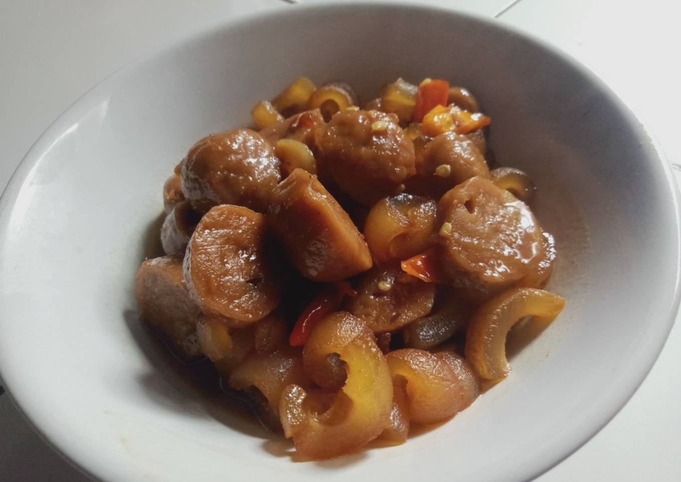Tumis kulit sapi dan bakso pedas