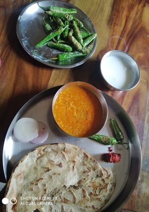 A picture of Urad Daal and Bajri Roti.