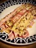 Rollitos de espárragos y jamón gratinados