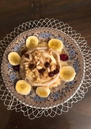 Una foto de Rulo de cabra con frutos secos y Miel