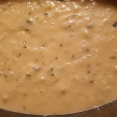 A picture of Potato cauliflower and cheese soup .
